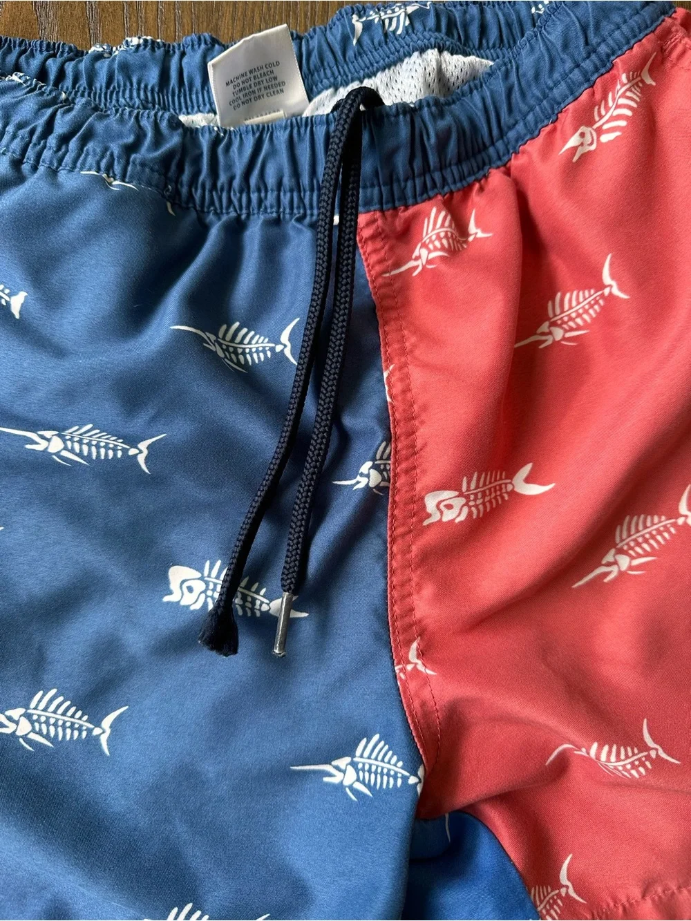 Vineyard Vines Kids Colorblock Fish-Skeleton Swim Trunks in Blue, Coral & Green